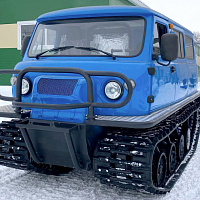 Uzola ZVM-2413 tracked snow and swamp-going vehicle with belt tracks