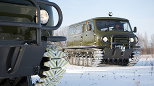 Tracked snow and swamp-going vehicles UZOLA